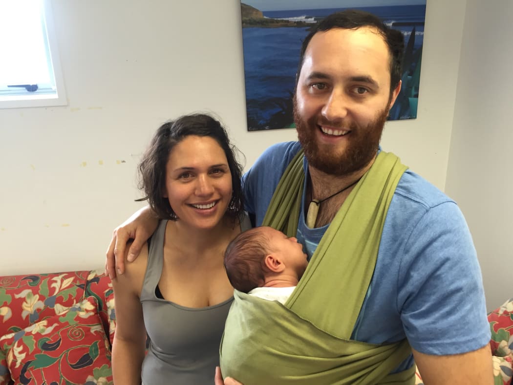 Malina Parkinson and Dave MacKenzie with baby Mila.