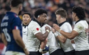 All Black Cam Roigard celebrates after scoring a try with All Blacks Peter Lakai, Beauden Barrett and Wallace Sititi during All Blacks v France Northern Tour match, Stade de France, Paris, France, Saturday, 16 November 2024. (Photo by Bob Martin / action press)