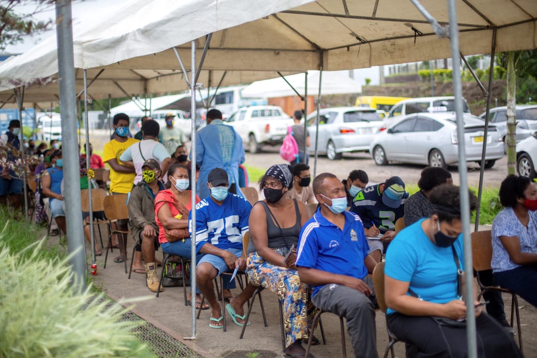 Residents waiting outside a vaccination centre for their AstraZeneca dose against Covid-19 in Suva, 9 July 2021.
