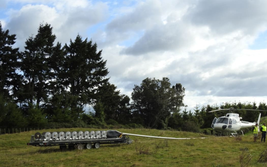 The heli-saw being used by The Lines Company to deal with problematic trees.