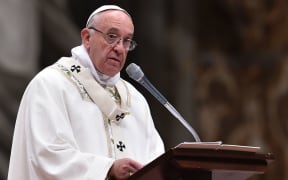Pope Francis speaks during the Easter Vigil at the St Peter's basilica.