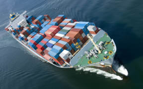 An aerial view of a container ship carrying exports (file)