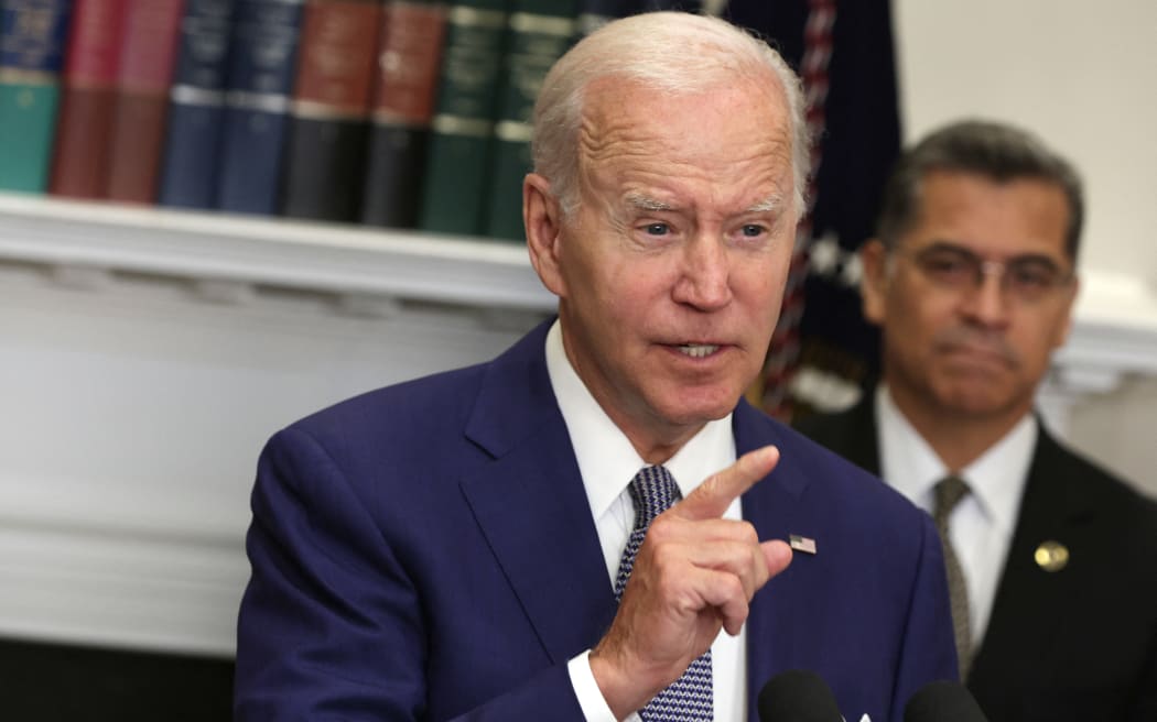 US President Joe Biden delivers remarks on reproductive rights as Secretary of Health and Human Services Xavier Becerra listens during an event at the Roosevelt Room of the White House on 8 July, 2022 in Washington, DC. President Biden signed an executive order on access to reproductive health care services.