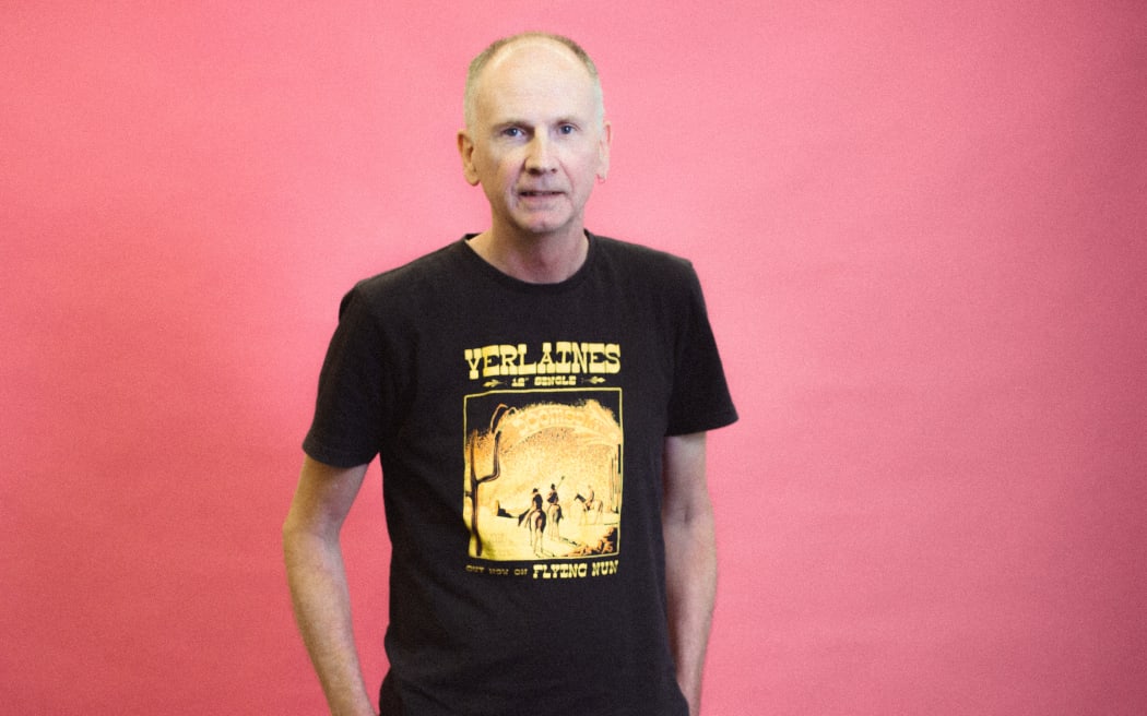 RNZ Concert producer Tim Dodd in his Verlaines t-shirt