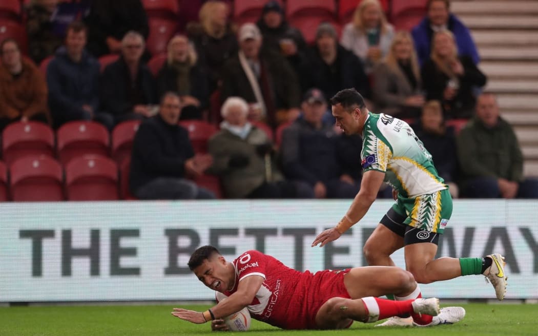 Tonga's Isaiya Katoa scores during the Rugby League World Cup Pool D match between Tonga and Cook Islands at the Riverside Stadium, Middlesbrough