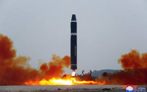 This picture taken on February 18, 2023 and released from North Korea's official Korean Central News Agency (KCNA) on February 19, 2023 shows test-firing of the intercontinental ballistic missile (ICBM) "Hwasong-15", at Pyongyang International Airport. (Photo by STRINGER / KCNA VIA KNS / AFP) / South Korea OUT / ---EDITORS NOTE--- RESTRICTED TO EDITORIAL USE - MANDATORY CREDIT "AFP PHOTO/KCNA VIA KNS" - NO MARKETING NO ADVERTISING CAMPAIGNS - DISTRIBUTED AS A SERVICE TO CLIENTS / THIS PICTURE WAS MADE AVAILABLE BY A THIRD PARTY. AFP CAN NOT INDEPENDENTLY VERIFY THE AUTHENTICITY, LOCATION, DATE AND CONTENT OF THIS IMAGE --- /