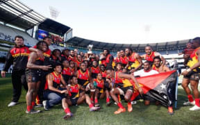 Papua New Guinea celebrate winning the 2017 AFL International Cup.