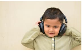 child with headphones