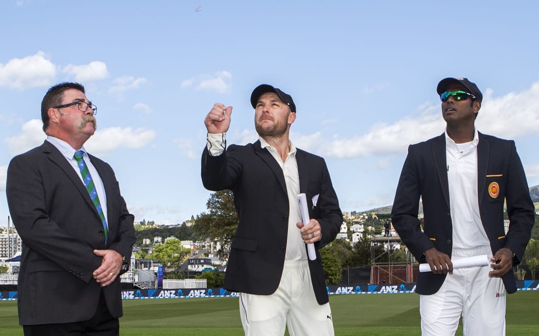 Brendon McCullum (middle) and Angelo Matthews at the toss for the first test in Dunedin.