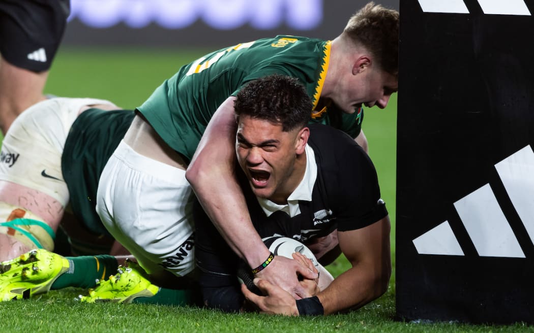 Quinn Tupaea celebrates scoring his try against the Springboks.