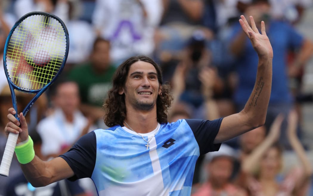 South Africa's Lloyd Harris reacts after winning against US player Reilly Opelka during their 2021 US Open Tennis tournament men's singles fourth round match at the USTA Billie Jean King National Tennis Center in New York, on September 6, 2021.