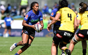 Maama Vaipulu in action for the Blues against the Hurricanes Poua.