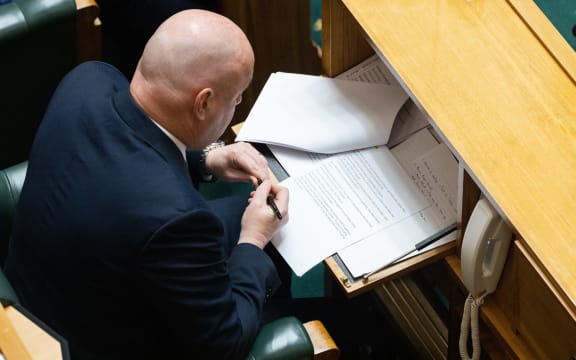 Christopher Luxon adds some last minute details to his Budget Debate speech.