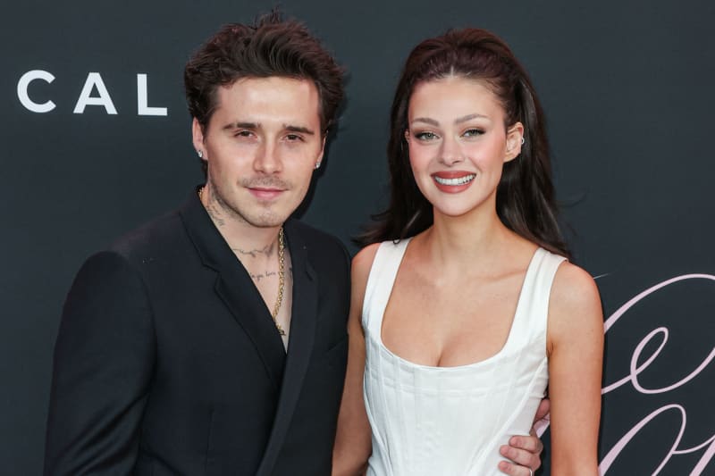 Brooklyn Peltz Beckham and wife Nicola Peltz Beckham arrive at the Los Angeles Premiere Of Vertical Entertainment's 'Lola' held at the Regency Bruin Theatre on February 3, 2024 in Westwood, Los Angeles, California, United States. (Photo by Xavier Collin/Image Press Agency/NurPhoto) (Photo by Image Press Agency / NurPhoto via AFP)