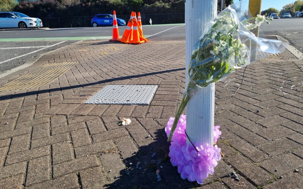 Several bunches of flowers have been laid at the corner of State highways 1C and 3 in Hamilton where Jayde Gilbert was hit and killed last week.