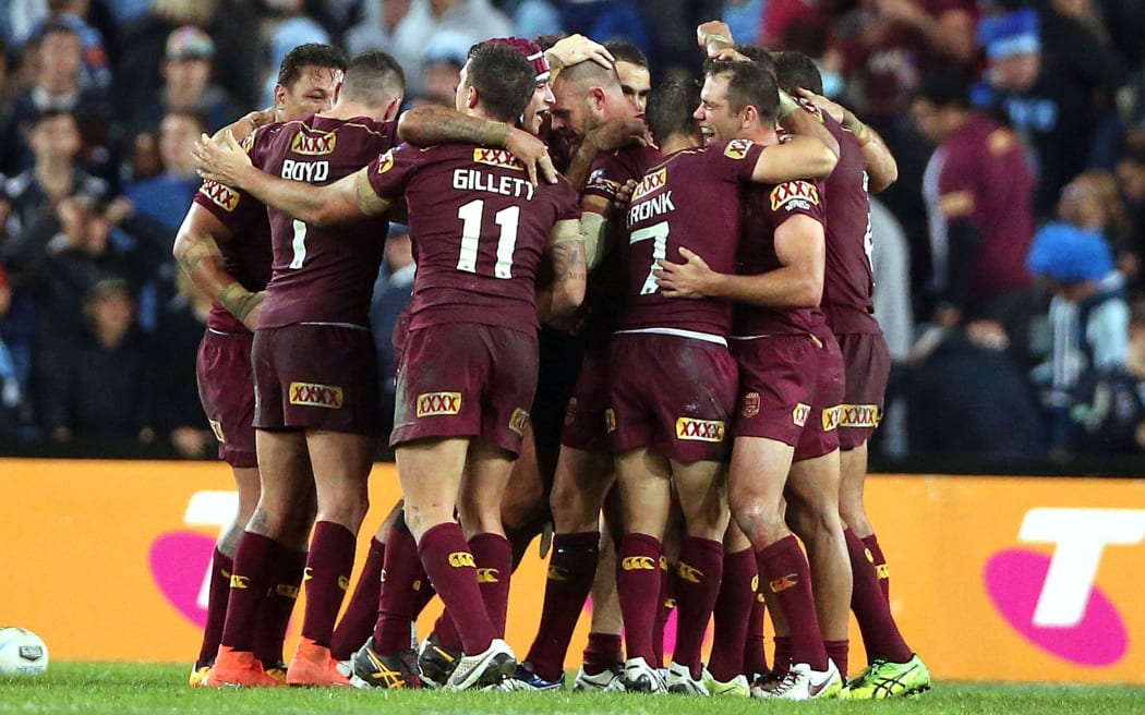 Queensland players celebrate winning State of Origin game one 2016.