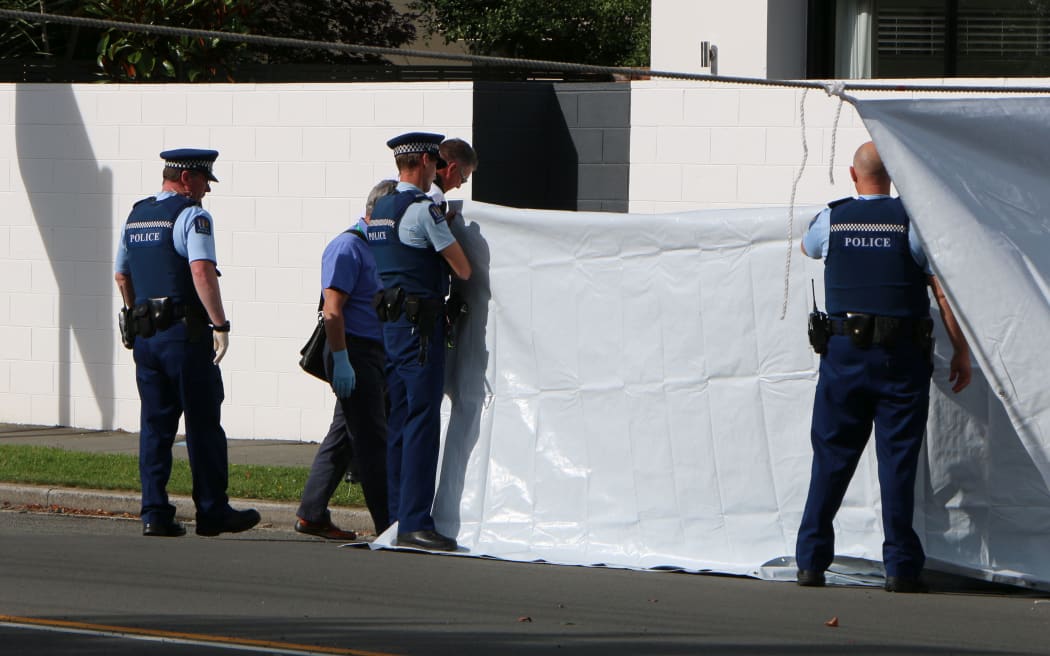 Police at the scene of an unexplained death on Opawa Rd in Christchurch.