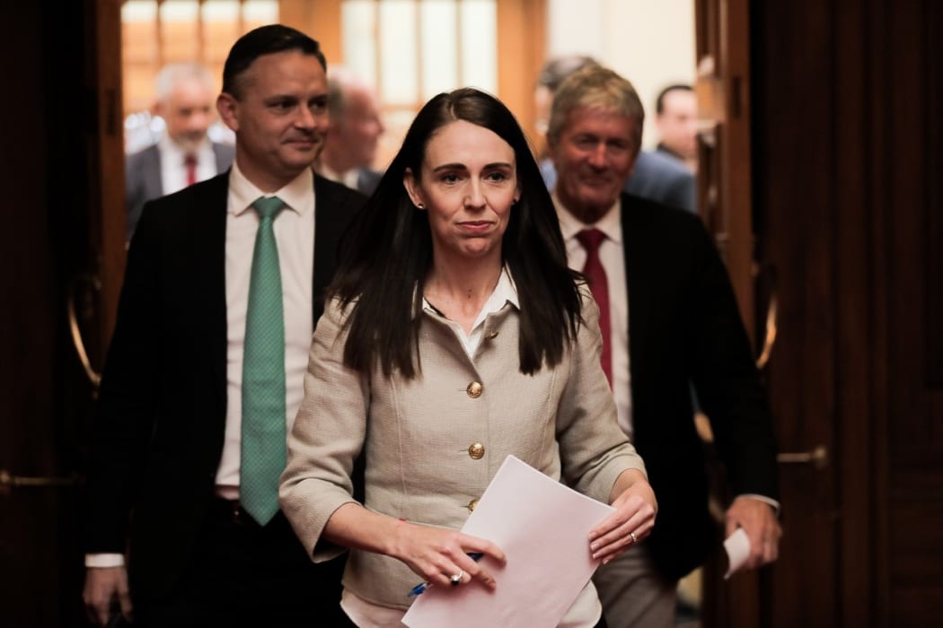 Prime Minister Jacinda Ardern, with Green party co-leader James Shaw, left) and Agriculture Minister Damien O'Connor prepare to announce the government's decision on agricultural emissions.