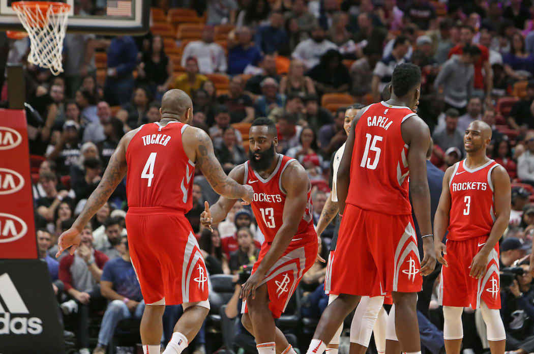 The Houston Rockets' James Harden (13) celebrates with teammates after a play during the fourth quarter against the Miami Heat in Miami, 7 February 2018
