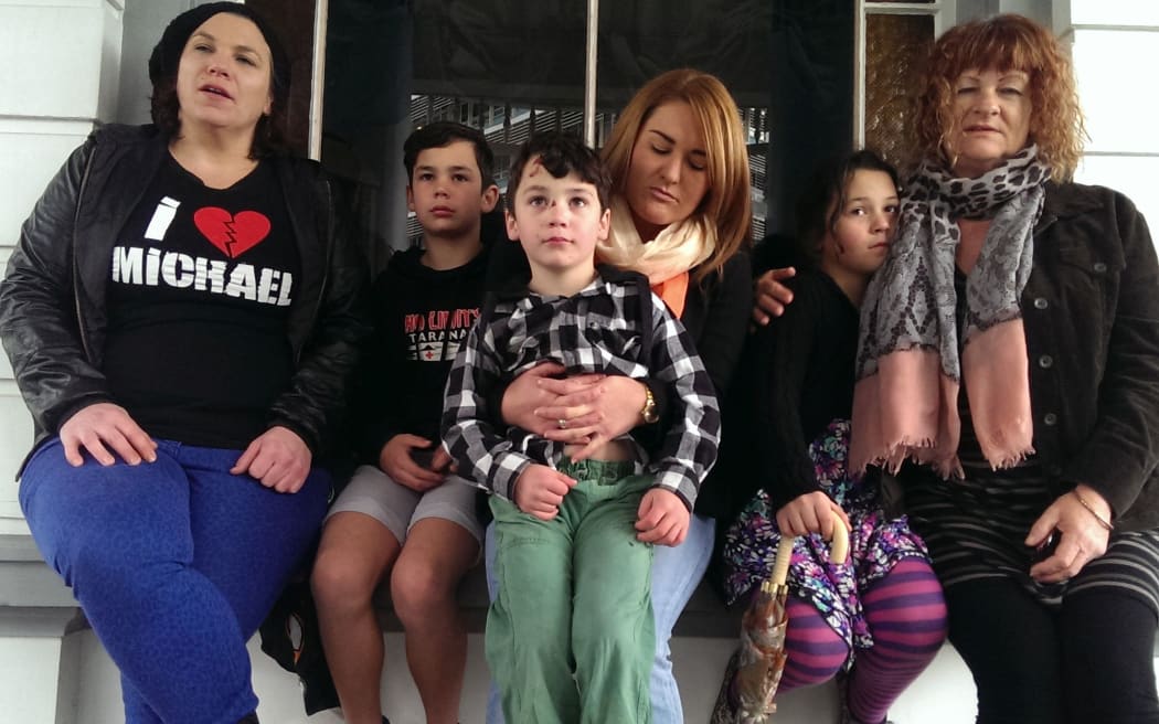 Michael Kane's family. From left: his partner Carly Gordon, sons Brodie and Riley, sister Sarah, daughter Isabella and his mother Sue.
