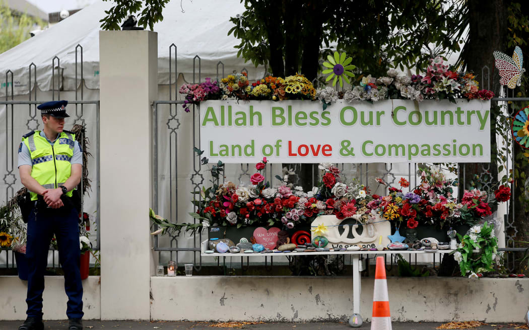 A police officer stands guard outside the Al Noor mosque in Christchurch, New Zealand on 15 March, 2020. The first anniversary of the Christchurch terror attacks.