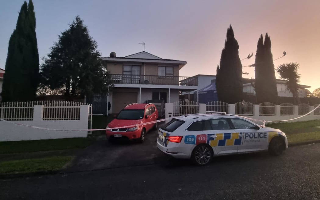 Police car seen outside a Clendon property in South Auckland on 12 August 2022.