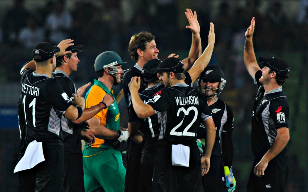 Jacob Oram celebrates the wicket of Graeme Smith during the 2011 quarter final win over South Africa.