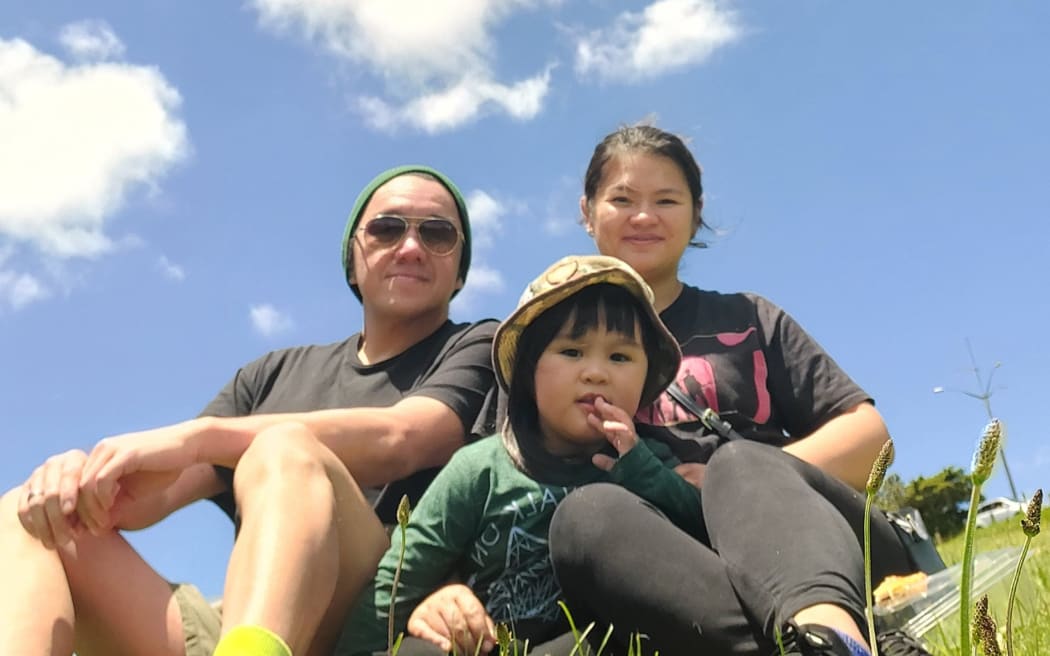 Swim school instructor Aaron Pasion, pictured with his wife Janine and son Andreus, was told his job was skilled and is leaving for Australia after finding out it no longer is.