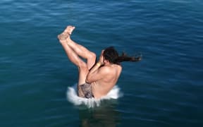 Supreme champion Kree Smith, of Northland’s Wainui Valley, hits the water at Russell's Manu Masters.