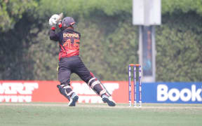 Wicketkeeper Kiplin Doriga topscored for PNG with 43 runs