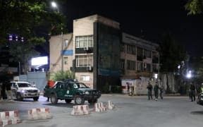Security forces take measures after powerful explosion with a bomb-laden vehicle followedby gunfire near residence of Afghan defense minister Bismillah Khan Mohammadi in Kabul.