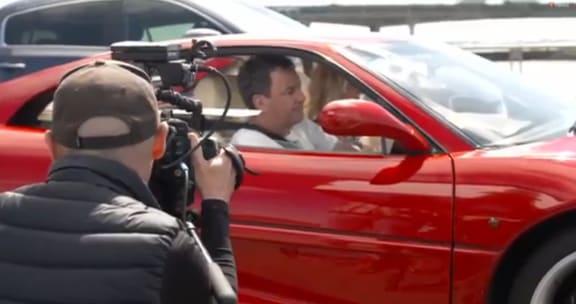 Mike Hosking appearing on his TVNZ news show Seven Sharp while helping out with Air New Zealand's marketing.