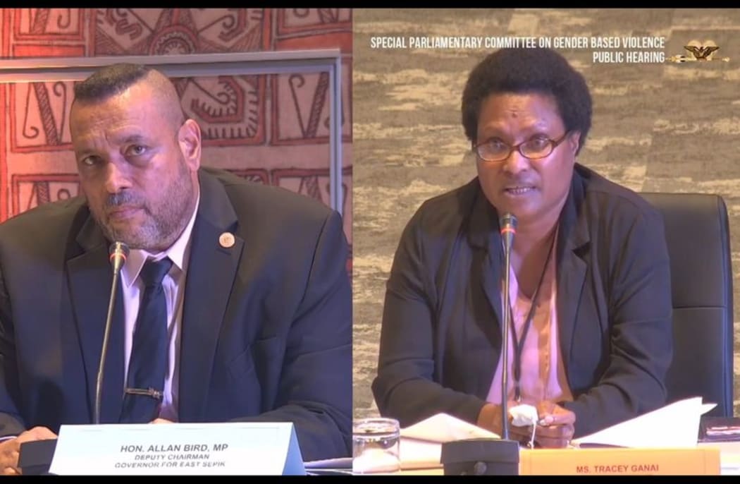 East Sepik Governor Allan Bird listens to Senior Magistrate Tracy Ganai at a Papua New Guinea Special Parliamentary Committee into Gender-based Violence.