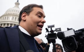 WASHINGTON, DC - DECEMBER 01: Rep. George Santos (R-NY) is surrounded by journalists as he leaves the U.S. Capitol after his fellow members of Congress voted to expel him from the House of Representatives on December 01, 2023 in Washington, DC. Charged by the U.S. Department of Justice with 23 felonies in New York including fraud and campaign finance violations, Santos, 35, was expelled from the House of Representatives by a vote of 311-114. Santos is only the sixth person in U.S. history to be expelled from the House of Representatives.   Drew Angerer/Getty Images/AFP (Photo by Drew Angerer / GETTY IMAGES NORTH AMERICA / Getty Images via AFP)