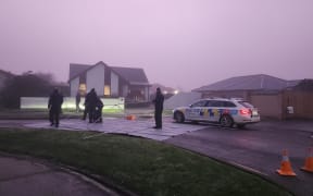 Police investigating the disappearance of Yanfei Bao continue the search at a house at Trevor Street, Hornby, on Tuesday morning, 25 July 2023.