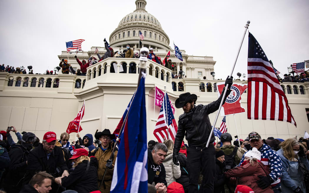 WASHINGTON, DC - JANUARY 06: Pro-Trump supporters storm the U.S. Capitol following a rally with President Donald Trump on January 6, 2021 in Washington, DC.