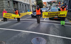 Protesters block traffic on Vivian Street, at the corner of Cuba Street, Wellington, 24 April 2023.