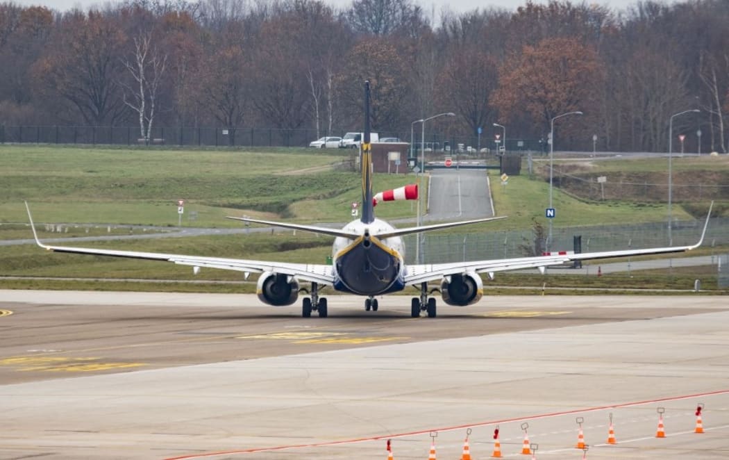Rear view of a Ryanair Boeing 737-800 while taxiing. Ryanair Irish low cost carrier Boeing 737 aircraft as seen departing from Eindhoven EIN EHEH Airport.