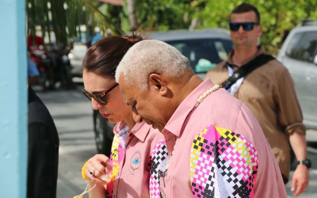 New Zealand prime minister Jacinda Ardern and Fiji prime minister Frank Bainimarama chat on the sidelines of last year's Pacific Islands Forum in Tuvalu.