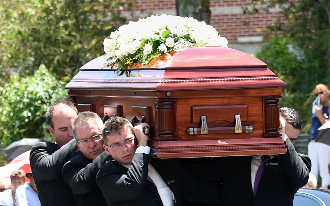Pallbearers carry the coffin of Australian batsman Phillip Hughes ahead of his funeral in his home town of Macksville in northern New South Wales.