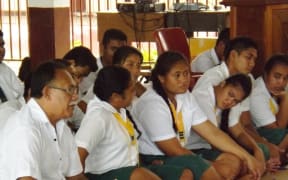Avele College principal talks to students.