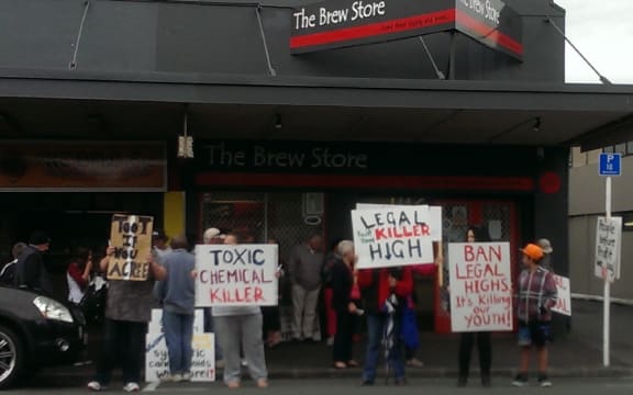 Legal high protestors outside The Brew Store in Whangarei.