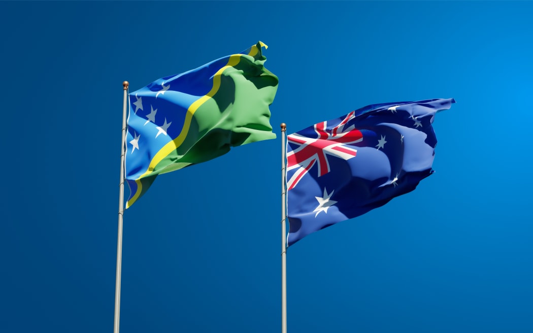 Beautiful national state flags of Solomon Islands and Australia together at the sky background. 3D artwork concept.
