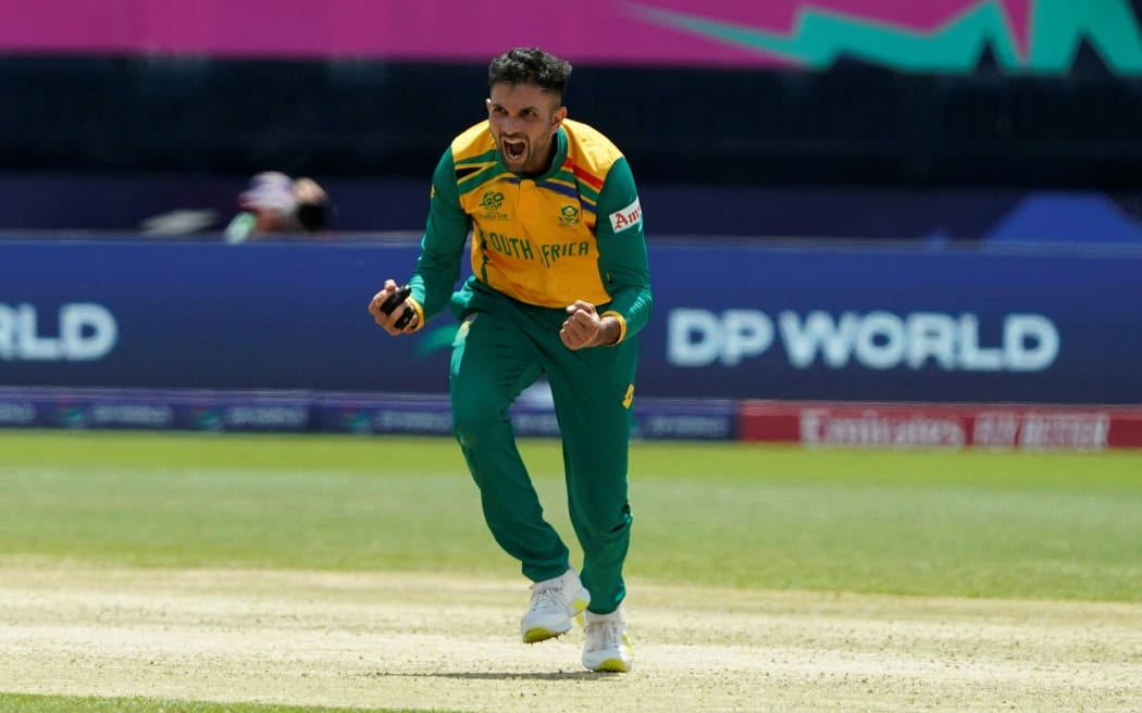 South Africa's Keshav Maharaj reacts after claiming a wicket.