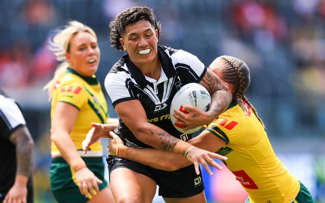 Gayle Broughton of the Ferns is tackled during the Women's Pacific Championships Final match between the Australian Jillaroos and the New Zealand Kiwi Ferns.