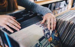 A woman shops for records