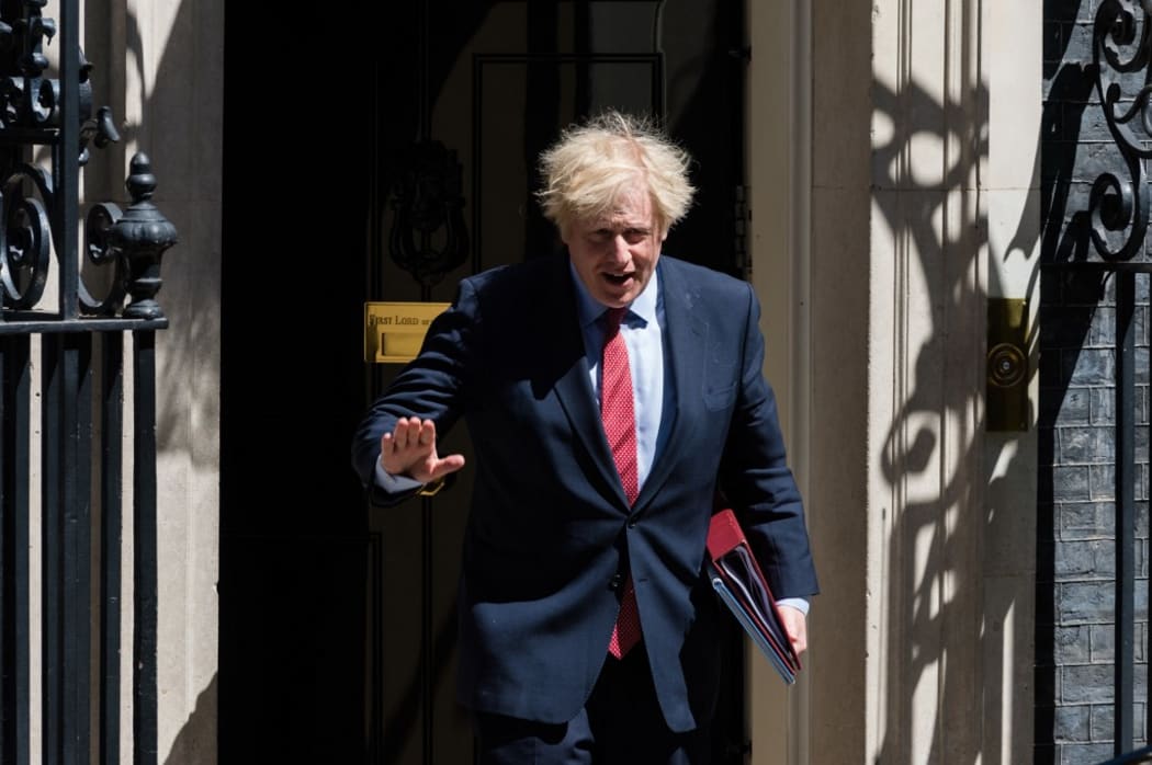 British Prime Minister Boris Johnson leaves 10 Downing Street for PMQs at the House of Commons on 20 May, 2020 in London, England. o)