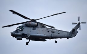 A second airforce helicopter arrives at Whakatane airport on Thursday to help with the removal of bodies from White Island eruption.