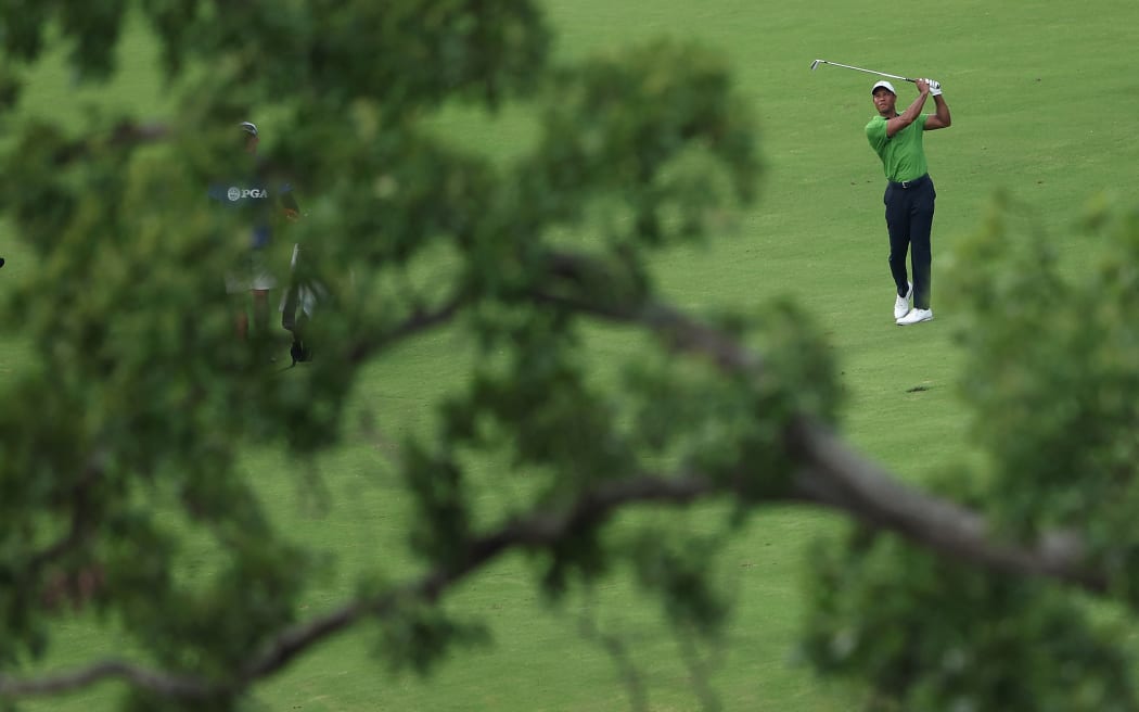 Tiger Woods of the United States plays a shot on the 18th hole during the second round of the 2022 PGA Championship at Southern Hills Country Club on May 20, 2022 in Tulsa, Oklahoma.