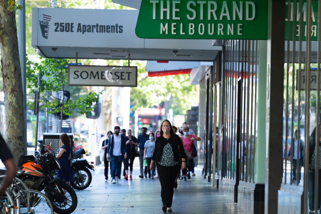 People are seen walking along Elizabeth Streeth on February 18, 2021 in Melbourne, Australia.